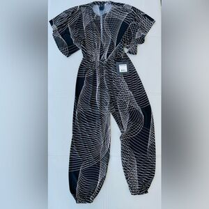 NWT! Norma Kamali 
Rectangle Jog Jumpsuit 
in Electric Circus 
Size XS/34